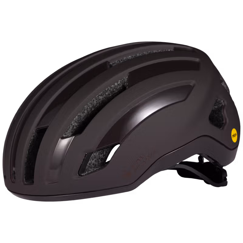 Angled side view of the matte Burnt Brown Outrider Mips road cycling helmet, showing its compact shape and rear ventilation.