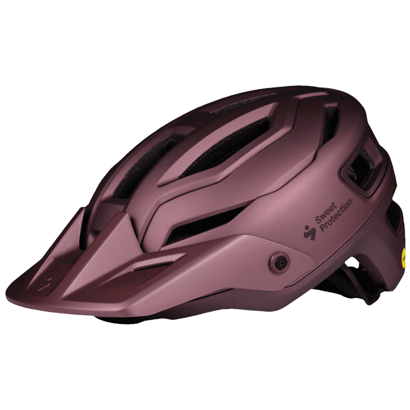 Three‑quarter view of the Trailblazer Mips helmet, barbera metallic — angled profile showing vents and shell contours (deep metallic burgundy / dark red)