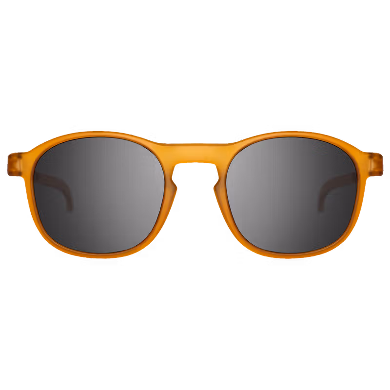 Three-quarter view of the Sweet Protection Heat sunglasses in matte crystal ochre with obsidian black lenses.