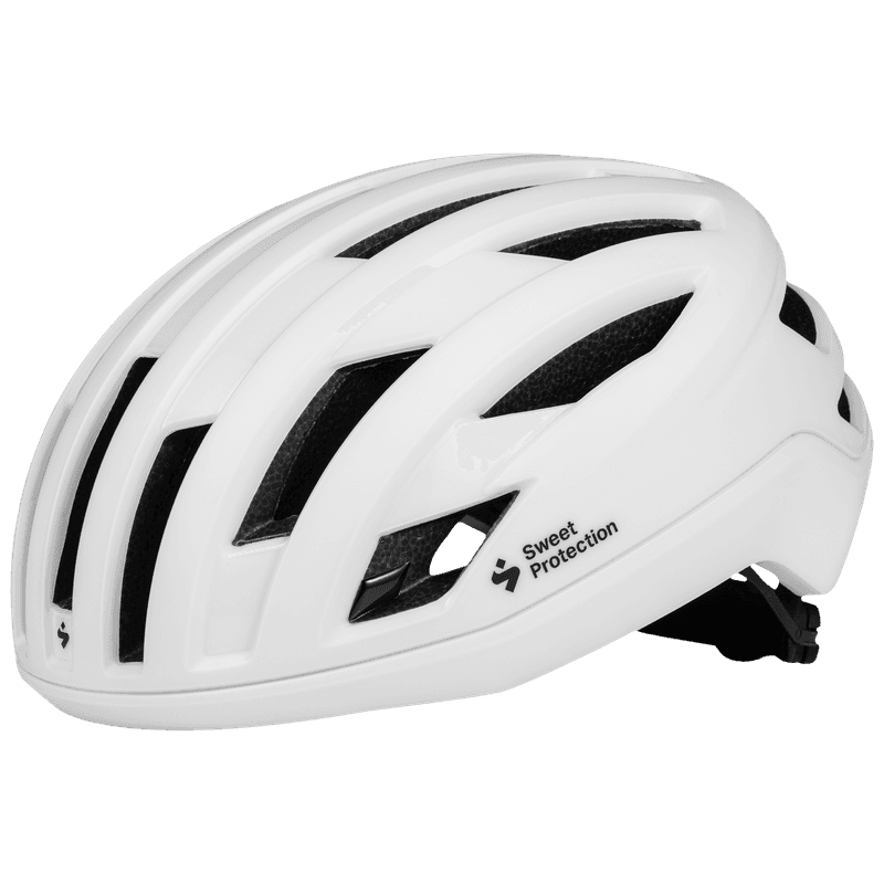 Side profile of the lightweight satin white Fluxer Mips cycling helmet by Sweet Protection, emphasizing its comfortable and secure fit for serious cyclists.